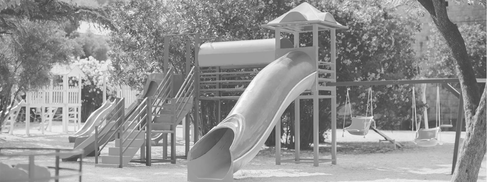 A nice playground with large jungle gym.